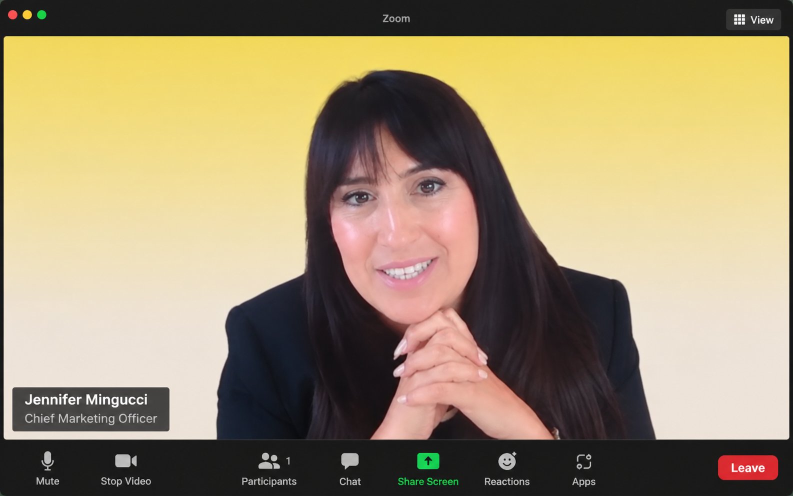 Jennifer hosting a Kinspire live session on Zoom, with her name and title badge over a branded yellow virtual background